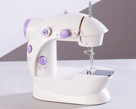 Máquina de coser multifuncional doméstica en miniatura