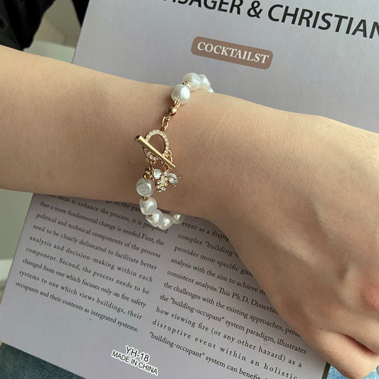 Exquisites Armband mit Perlenanhänger: Klassisches Geschenk zum Jahrestag